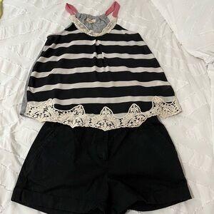 Black shorts with black striped top